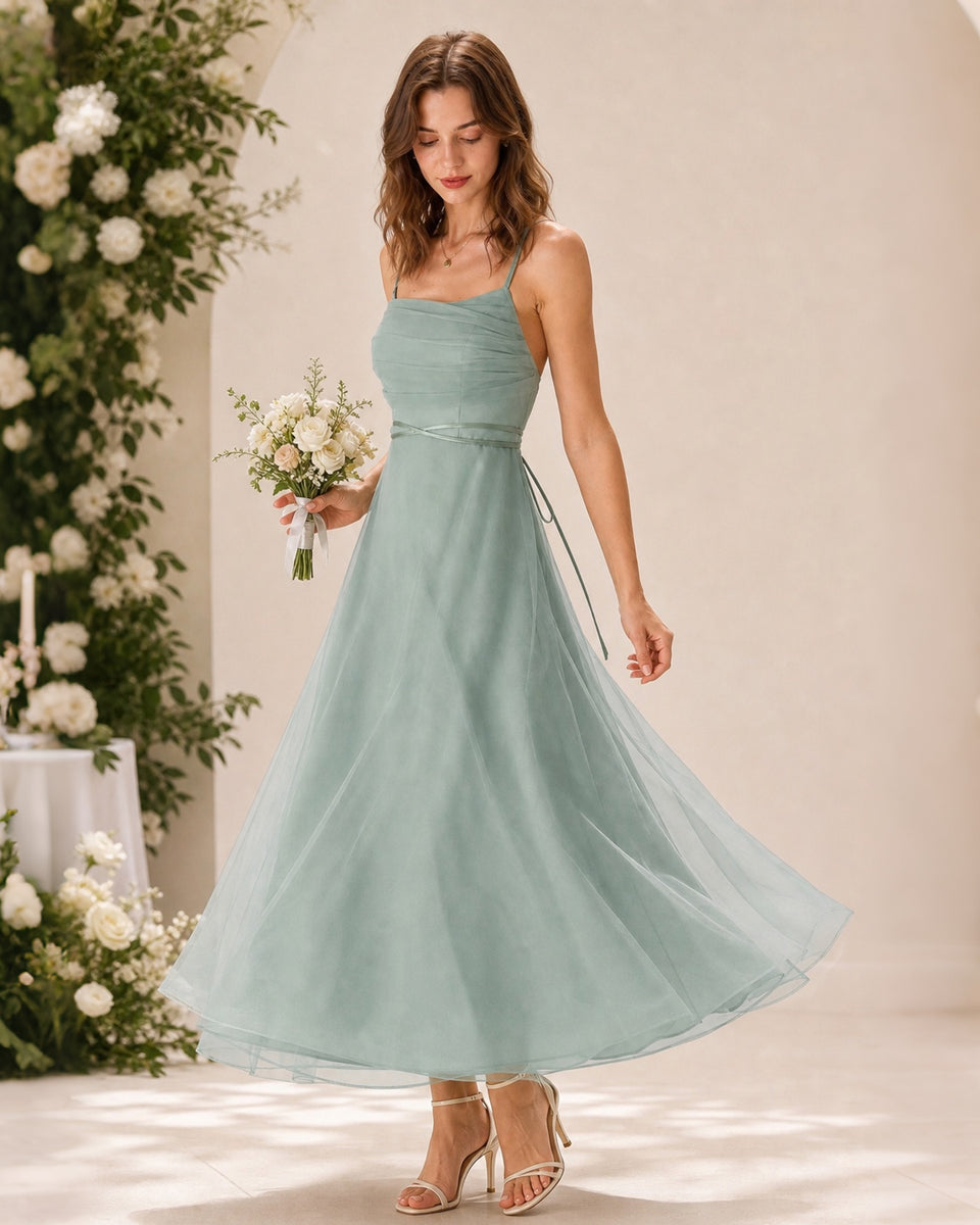 Green mesh flowy slip midi dress for a summer wedding guest who wants to dance