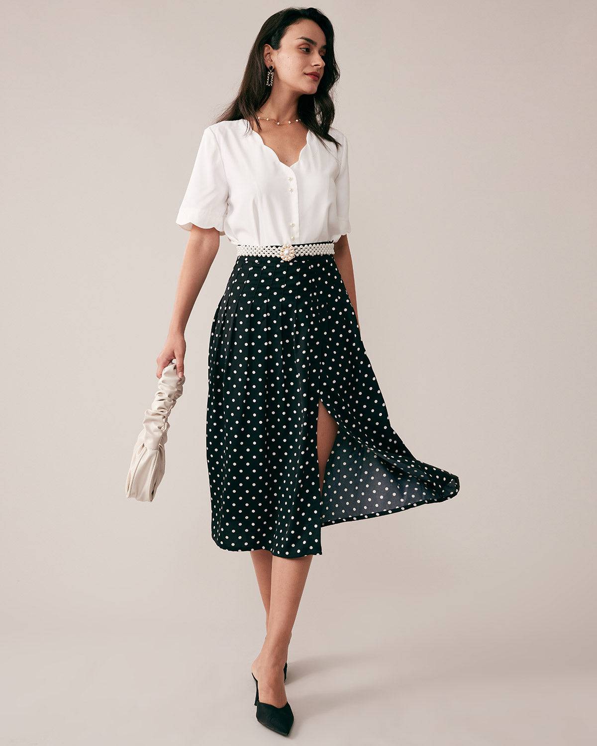 https://www.rihoas.com/cdn/shop/products/skirts-the-polka-dots-a-line-skirt-37177873236181.jpg?v=1663216594