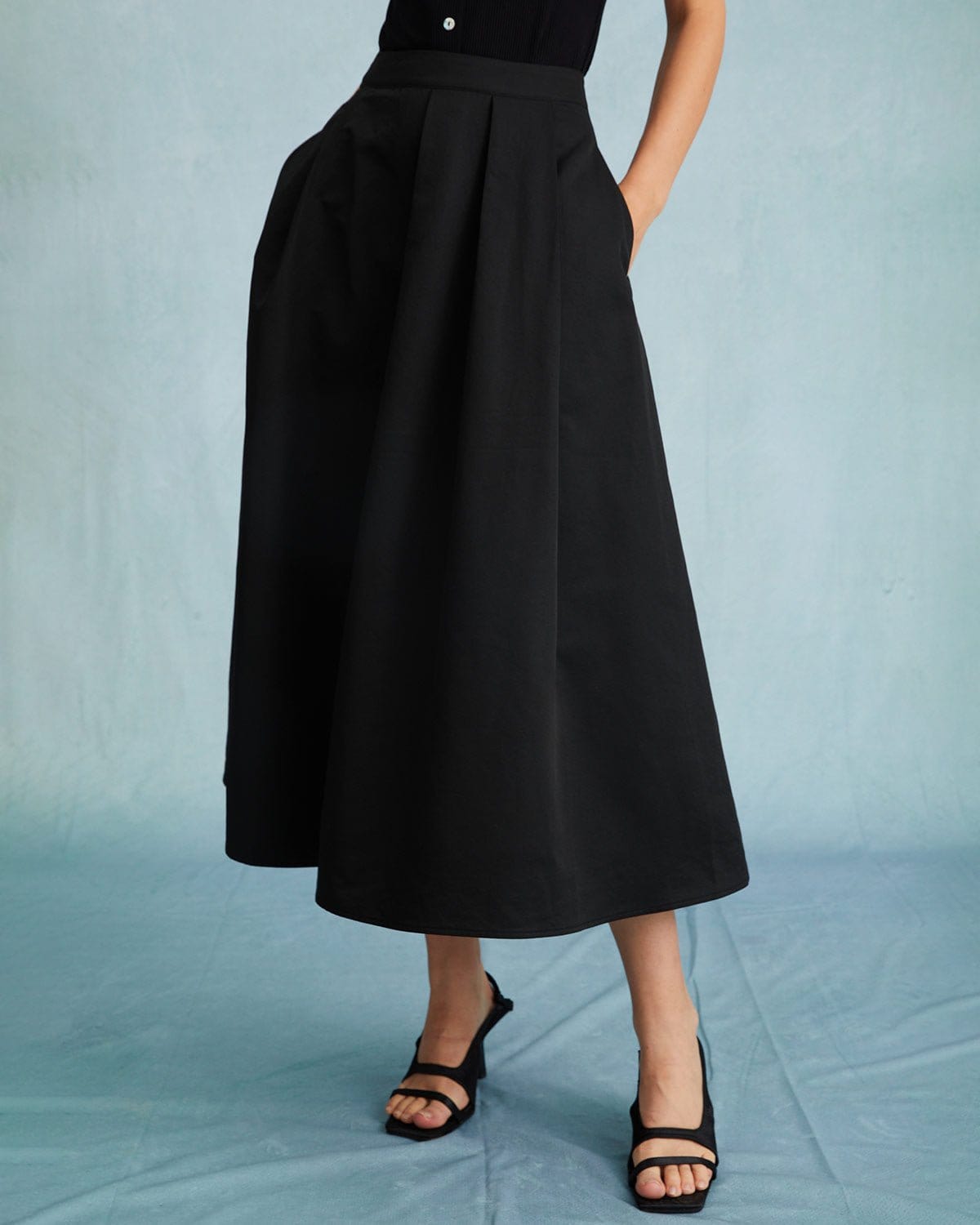 The Black High Waisted Pleated Midi Skirt